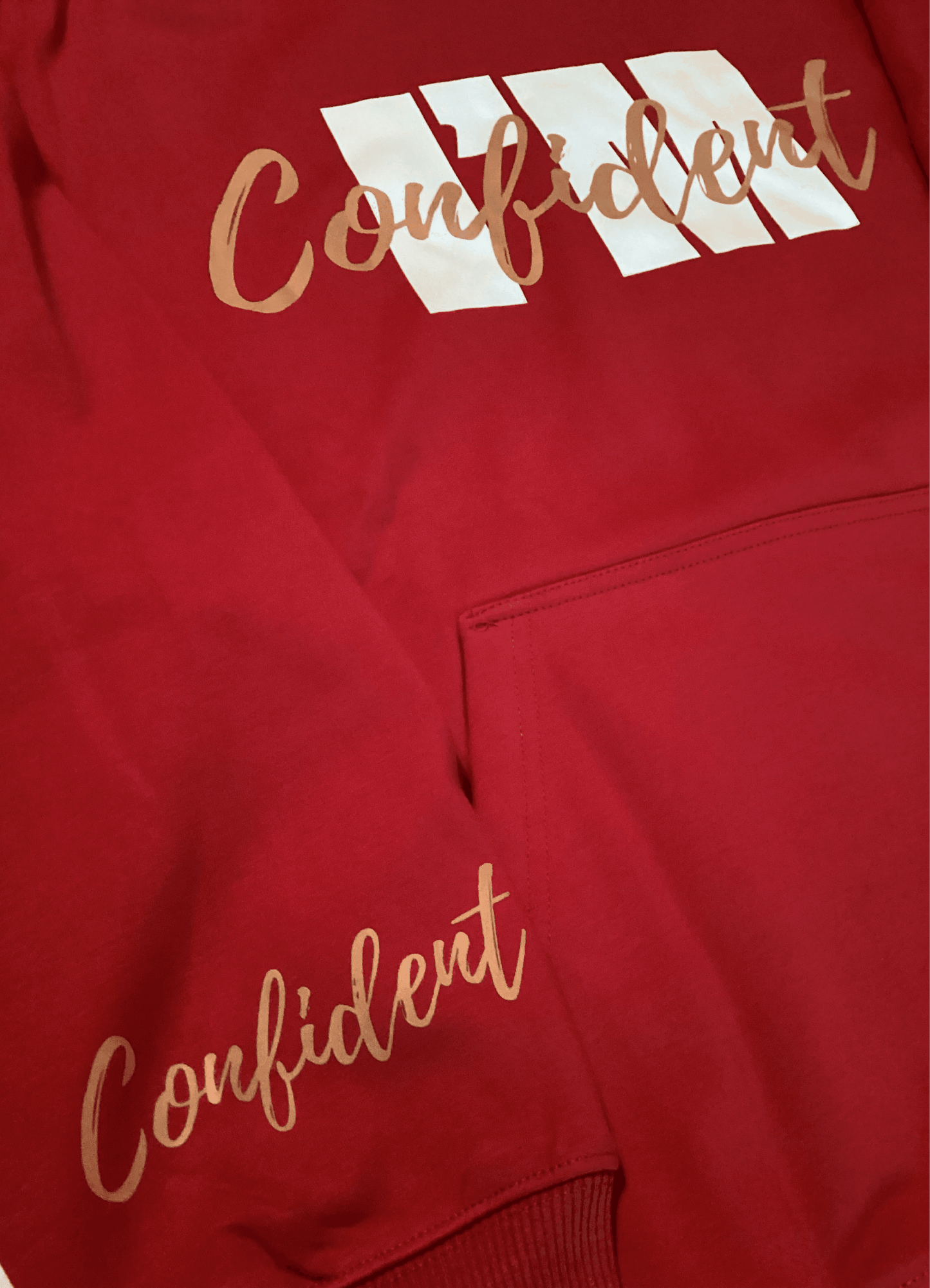 I’m Confident hoodie in bold red with stylish 'Confident' text on chest and sleeve. Unleash positive energy with our I'm Confident sweater.